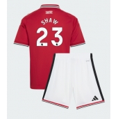 Otroški Manchester United Luke Shaw #23 Replika nogometni dresi kompleti Domači 2026-27 Kratek Rokav (+ hlače)
